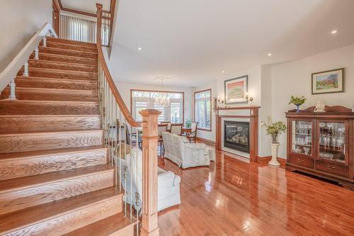 Staircase - 2 Place De Montmedy, Lorraine, QC - Indoor Photo Showing Other Room With Fireplace