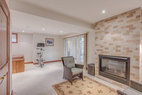 Family room - 2 Place De Montmedy, Lorraine, QC - Indoor With Fireplace