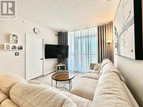 1604 - 1328 Birchmount Road, Toronto, ON - Indoor Photo Showing Living Room