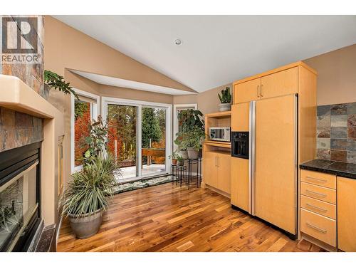 3929 Gallaghers Circle, Kelowna, BC - Indoor With Fireplace