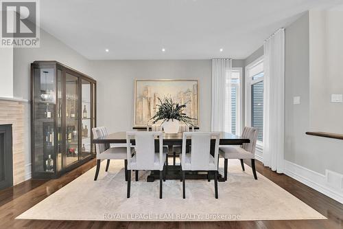 743 Brian Good Avenue, Ottawa, ON - Indoor Photo Showing Dining Room With Fireplace