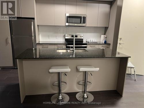 106 - 101 Cathedral High Street, Markham, ON - Indoor Photo Showing Kitchen With Upgraded Kitchen