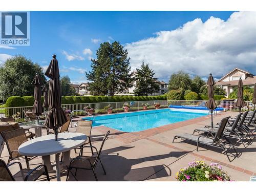 2300 Benvoulin Road Unit# 103, Kelowna, BC - Outdoor With In Ground Pool With Deck Patio Veranda