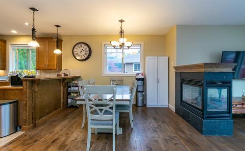 36-1581 20 Street, Salmon Arm, BC - Indoor Photo Showing Dining Room With Fireplace