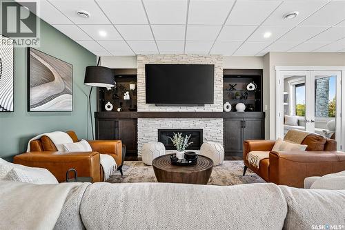 127 Iron Bridge Drive, Moose Jaw, SK - Indoor Photo Showing Living Room With Fireplace