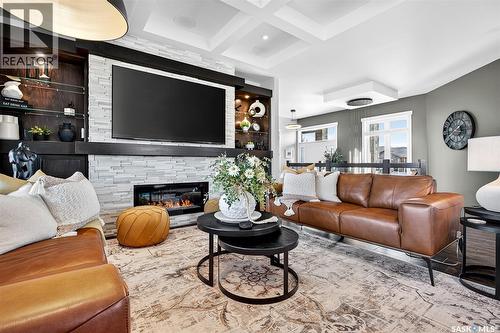 127 Iron Bridge Drive, Moose Jaw, SK - Indoor Photo Showing Living Room With Fireplace