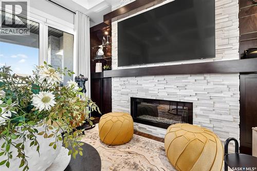 127 Iron Bridge Drive, Moose Jaw, SK - Indoor Photo Showing Living Room With Fireplace