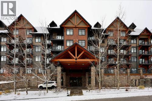 1549 Kicking Horse Trail Unit# 415 (A&B), Golden, BC - Outdoor With Balcony With Facade