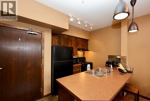 1549 Kicking Horse Trail Unit# 415 (A&B), Golden, BC - Indoor Photo Showing Kitchen With Double Sink