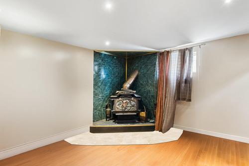 Family room - 2010 Rue Mayfield, Laval (Chomedey), QC - Indoor With Fireplace