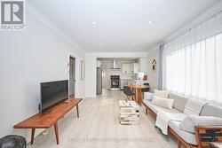 Bright living room with cozy ambiance - 