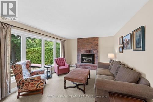 1119 Firefly Lane, Ottawa, ON - Indoor Photo Showing Living Room With Fireplace
