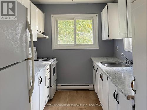 301 - 1000 Pembridge Crescent, Kingston (North Of Taylor-Kidd Blvd), ON - Indoor Photo Showing Kitchen With Double Sink
