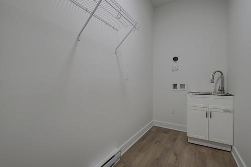 Salle de lavage - 304-2010 Rue De Chambly, Saint-Bruno-De-Montarville, QC - Indoor Photo Showing Other Room