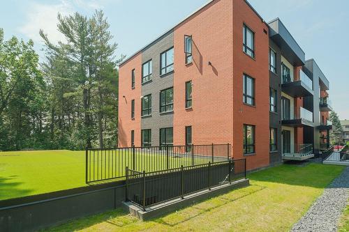 Back facade - 304-2010 Rue De Chambly, Saint-Bruno-De-Montarville, QC - Outdoor