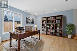 Virtually Staged Main Floor Den - 