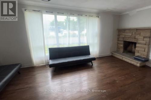 1152 Tawney Road, Ottawa, ON - Indoor Photo Showing Living Room With Fireplace