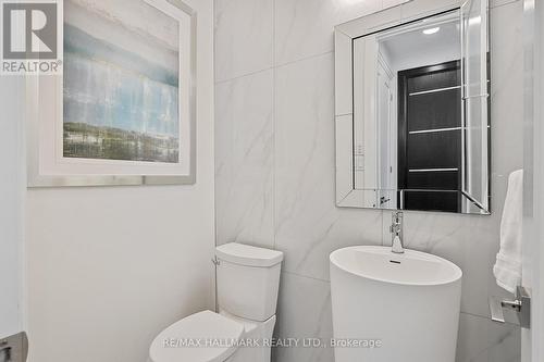 Main floor powder room. - 129 High Street W, Mississauga, ON - Indoor Photo Showing Bathroom