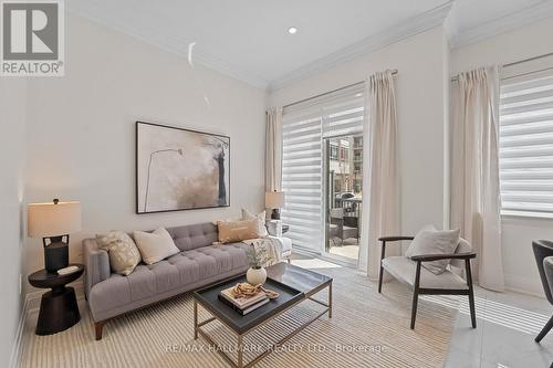 Sunny family room, perfect for gatherings. - 129 High Street W, Mississauga, ON - Indoor Photo Showing Living Room