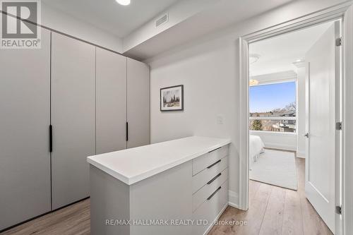 Includes walk-in closet with custom island. - 129 High Street W, Mississauga, ON - Indoor Photo Showing Other Room