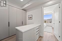 Includes walk-in closet with custom island. - 