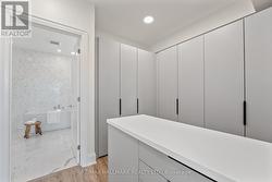 Plenty of storage with walk-out to primary ensuite - 