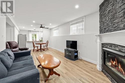1C - 75 Lapointe Boulevard, Russell, ON - Indoor Photo Showing Living Room With Fireplace