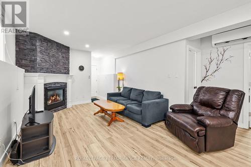 1C - 75 Lapointe Boulevard, Russell, ON - Indoor Photo Showing Living Room With Fireplace