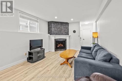 1C - 75 Lapointe Boulevard, Russell, ON - Indoor Photo Showing Living Room With Fireplace