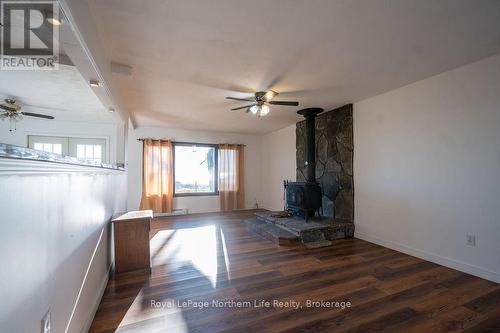 1417 Jocko Point Road, North Bay (Jocko Point / Beaucage), ON - Indoor Photo Showing Other Room With Fireplace