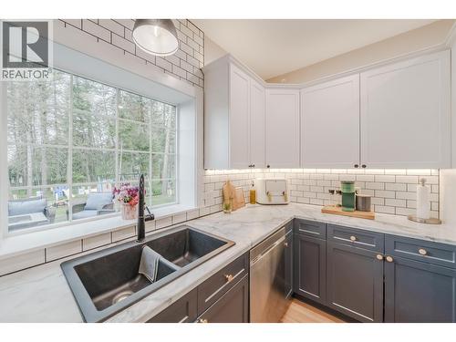 4908 Kitwanga Drive, 108 Mile Ranch, BC - Indoor Photo Showing Kitchen With Double Sink