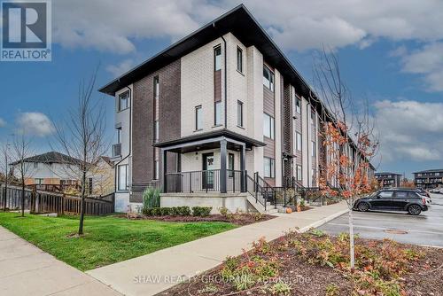4 Lily Lane, Guelph, ON - Outdoor With Facade