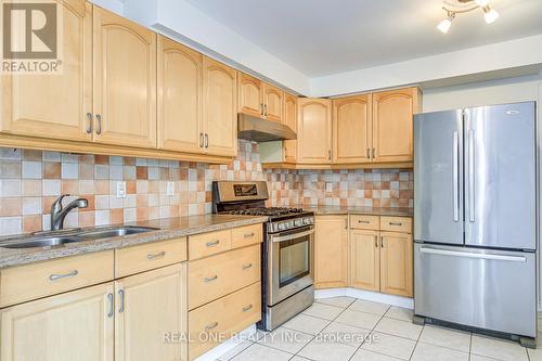 220 Kingsbridge Garden Circle, Mississauga, ON - Indoor Photo Showing Kitchen With Double Sink