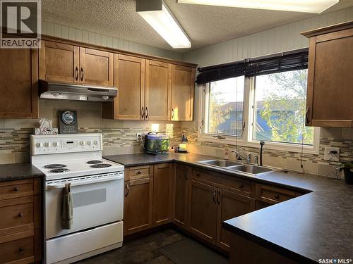 508 Cochin Avenue, Meadow Lake, SK - Indoor Photo Showing Kitchen With Double Sink