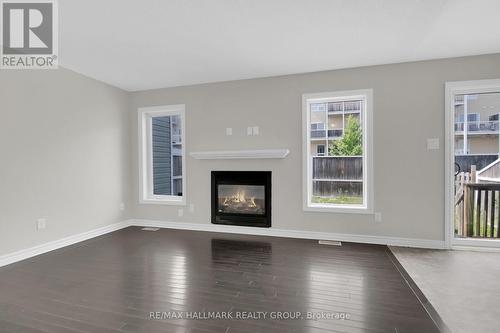 Family room - 418 Temiskaming Crescent, Ottawa, ON - Indoor With Fireplace