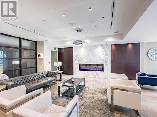 2003 - 38 Lee Centre Drive, Toronto, ON - Indoor With Fireplace