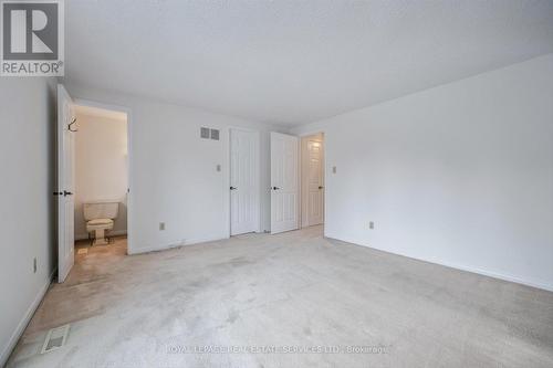 Oversized Primary Bedroom with a Walk-In Closet - 7 - 1241 Mccraney Street E, Oakville, ON - Indoor Photo Showing Other Room