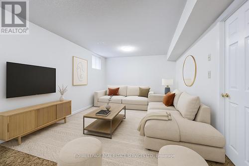 Virtually Staged Recreation Room - 7 - 1241 Mccraney Street E, Oakville, ON - Indoor Photo Showing Living Room