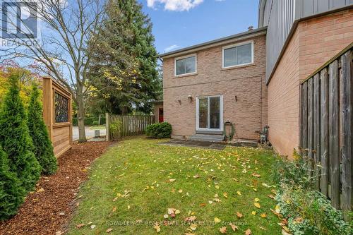 Sliding Door Walkout to Backyard from Living Room - 7 - 1241 Mccraney Street E, Oakville, ON - Outdoor