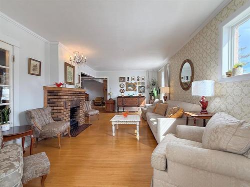 295 8Th Avenue, Virden, MB - Indoor Photo Showing Living Room With Fireplace