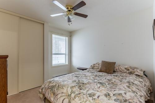 208-1329 Klo Road, Kelowna, BC - Indoor Photo Showing Bedroom
