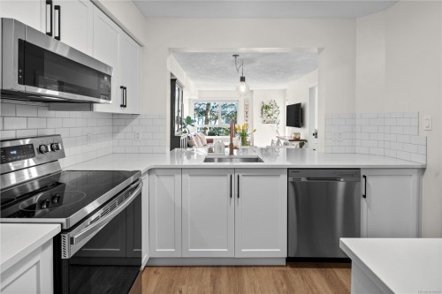 220-2245 James White Blvd, Sidney, BC - Indoor Photo Showing Kitchen With Stainless Steel Kitchen With Upgraded Kitchen