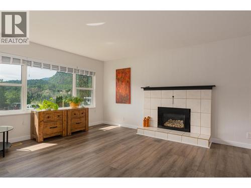 3725 Dogwood Drive, Trail, BC - Indoor Photo Showing Living Room With Fireplace