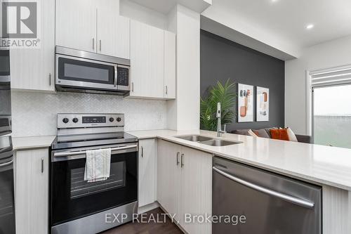 627 - 1105 Leger Way, Milton, ON - Indoor Photo Showing Kitchen With Double Sink With Upgraded Kitchen