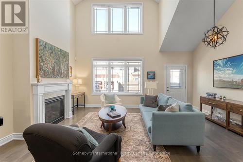 4 Emerson Mews, Collingwood, ON - Indoor Photo Showing Living Room With Fireplace