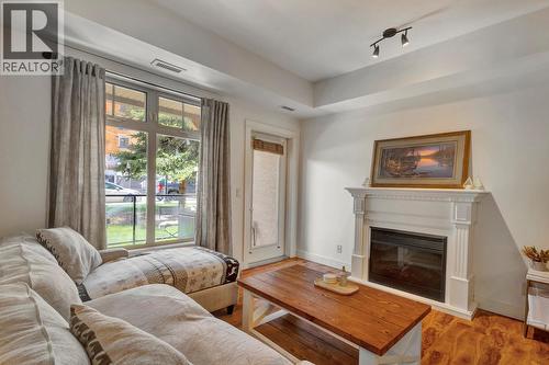 2551 Shoreline Drive Unit# 113, Lake Country, BC - Indoor Photo Showing Living Room With Fireplace