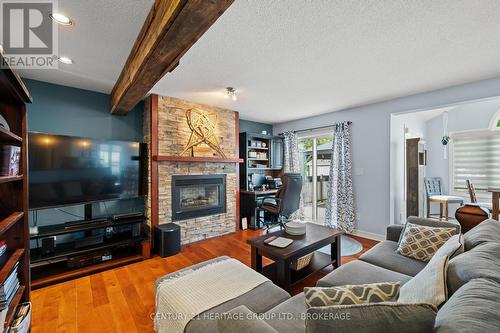 26 Miller Place, Loyalist (Amherstview), ON - Indoor Photo Showing Living Room With Fireplace