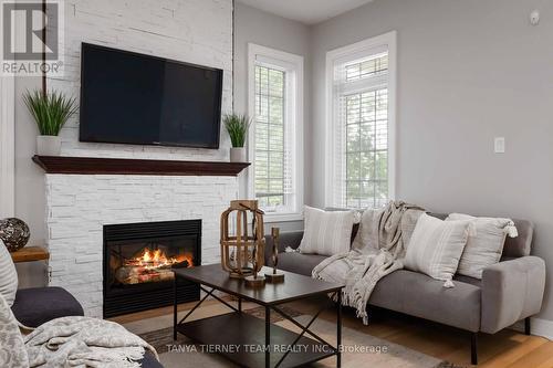 26 Wilshire Drive, Whitby, ON - Indoor Photo Showing Living Room With Fireplace