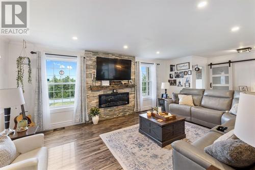 22-24 Kingmans Cove Road, Fermeuse, NL - Indoor Photo Showing Living Room With Fireplace