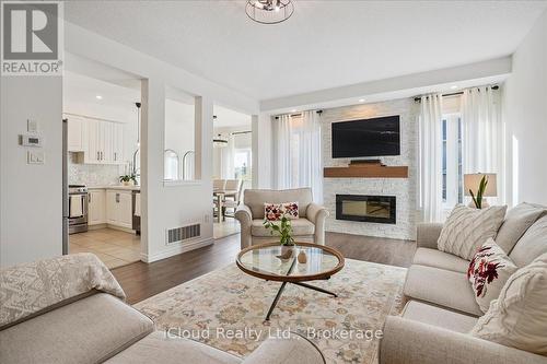 136 Dunrobin Lane, Grimsby, ON - Indoor Photo Showing Living Room With Fireplace